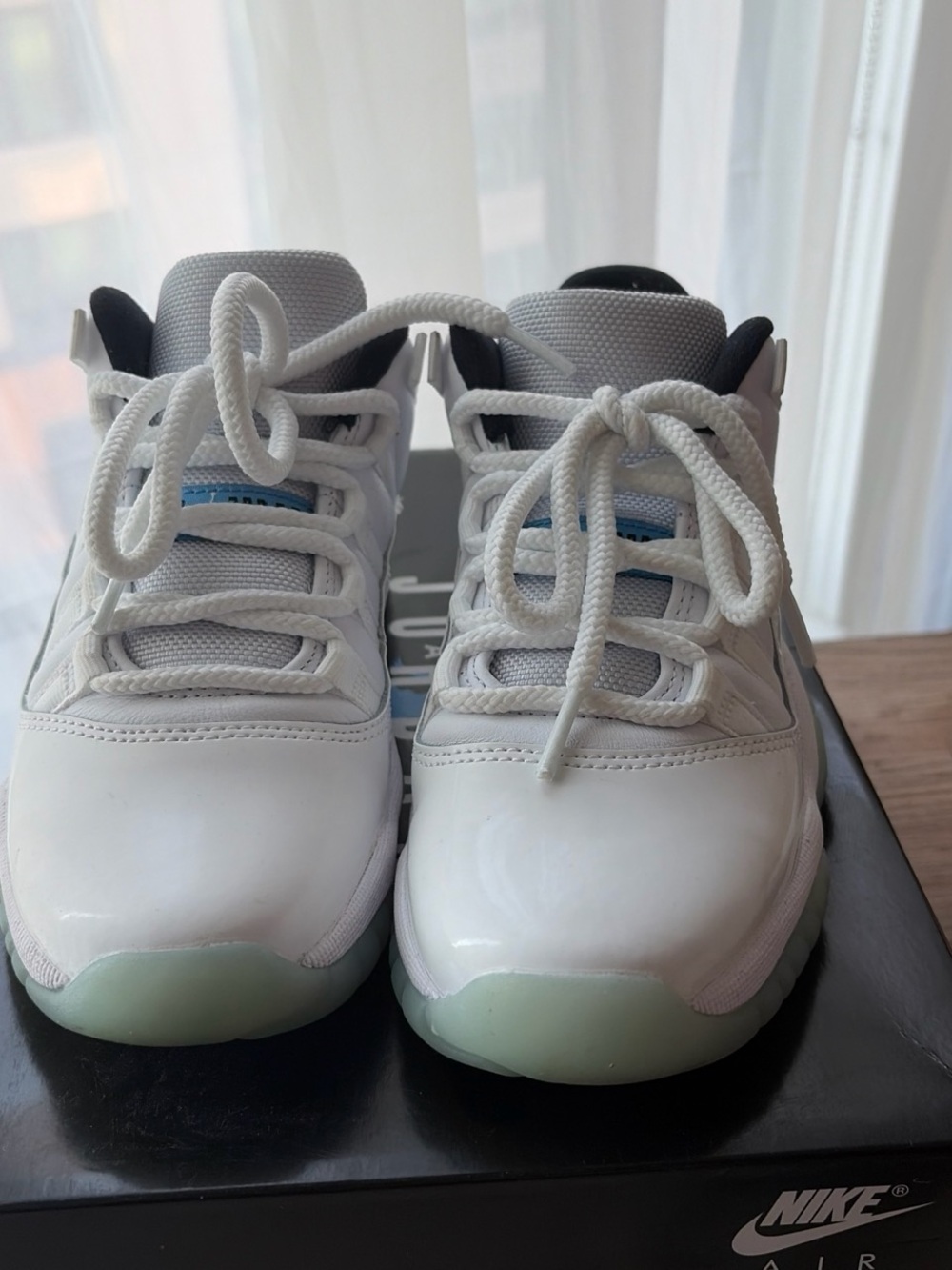 Nike Kids White Sneakers with Light Blue Accents